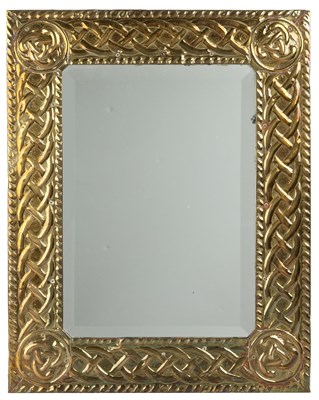 Lot 78 - An arts and crafts pressed brass framed wall...