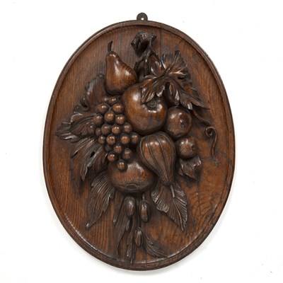 Lot 13 - An 18th/19th century carved oak oval panel...