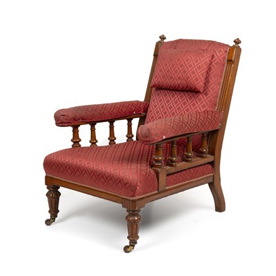 Lot 85 - A Victorian oak upholstered armchair the open...