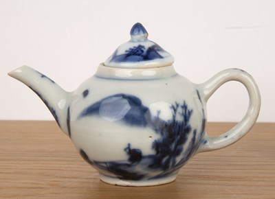 Lot 111 - Miniature blue and white teapot and three cups...