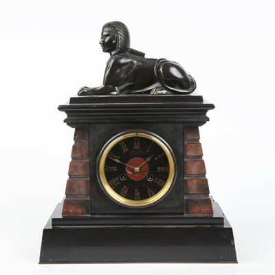 Lot 179 - A late 19th century slate mantle clock with a...