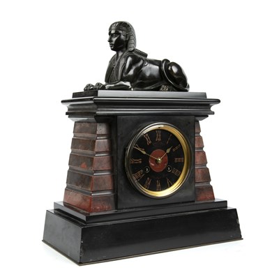 Lot 179 - A late 19th century slate mantle clock with a...