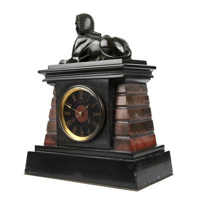 Lot 179 - A late 19th century slate mantle clock with a...