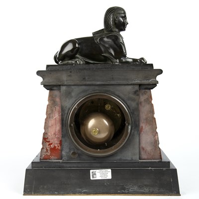 Lot 179 - A late 19th century slate mantle clock with a...