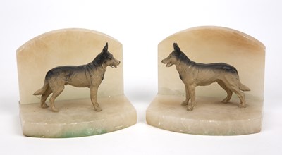 Lot 168 - A pair of alabaster and spelter book ends in...