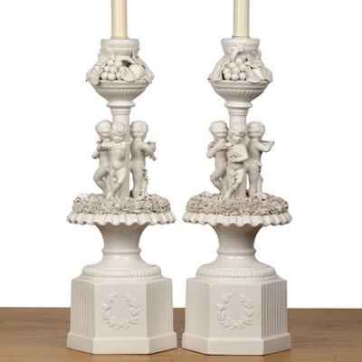 Lot 278 - Pair of white glazed table lamps Italian, the...