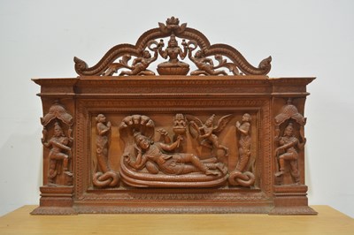 Lot 432 - Hardwood arched panel Indian carved with a...