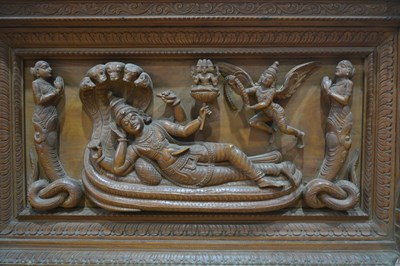 Lot 432 - Hardwood arched panel Indian carved with a...
