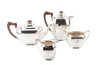 Lot A silver four piece tea service, of panelled...