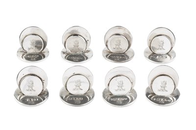 Lot 512 - A set of eight Edwardian silver menu holders,...