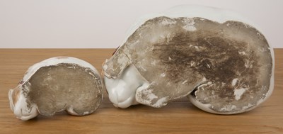 Lot 170 - Two porcelain recumbent cats Japanese, Meiji...