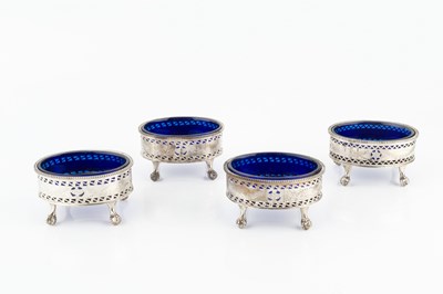 Lot 286 - A set of four Edwardian silver oval salts, of...