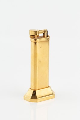 Lot 222 - A gold plated table lighter by Dunhill, of...