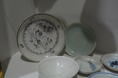 Lot 123 - Group of blue and white and celadon porcelain...