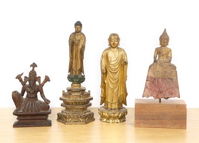 Lot 448 - Group of four wood deities Indian, Thai and...