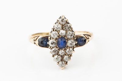 Lot A sapphire and diamond ring, of marquise form,...