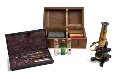 Lot 236 - A microscope and a set of compasses