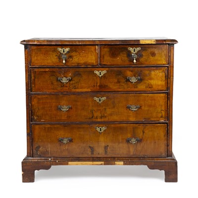 Lot 180 - An 18th century walnut chest of two short and...