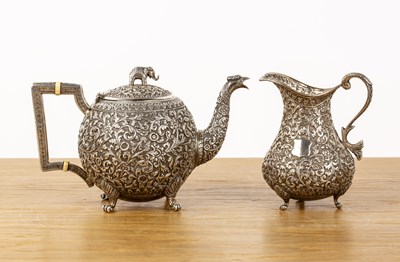 Lot 260 - Indian Cutch teapot and similar jug late 19th...