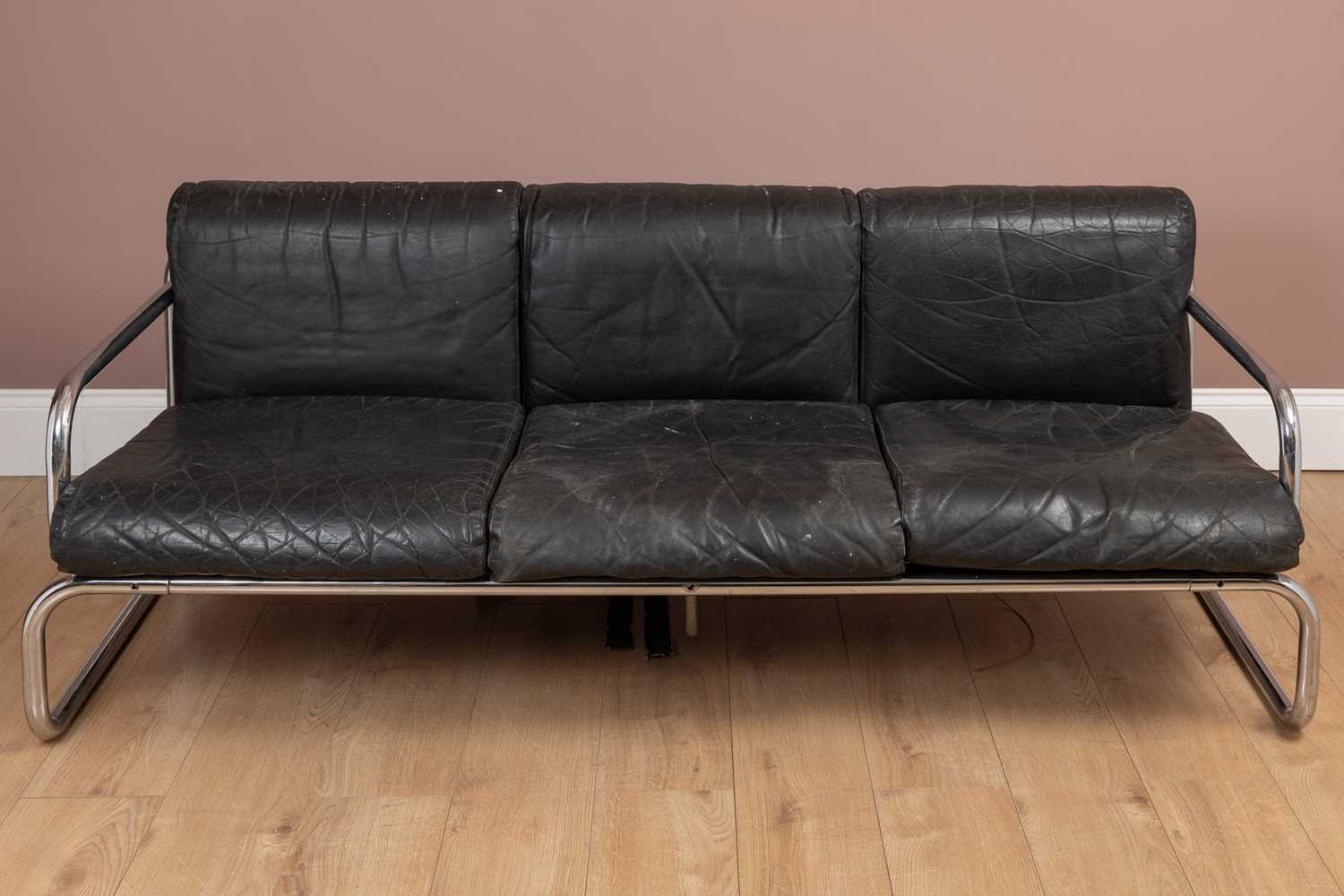 Lot 1122 - A pair of tubular chrome and leather sofas by Rodney Kinsman for OMK