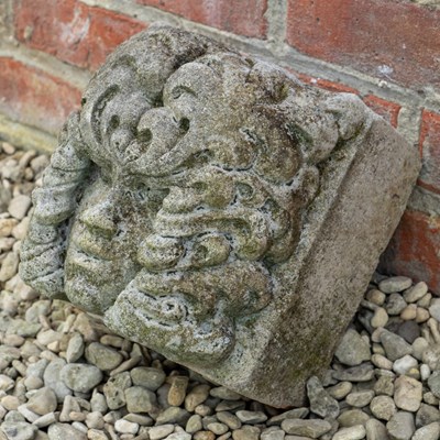 Lot 1226 - A cast reconstituted stone corbel