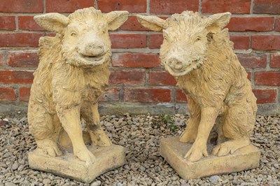 Lot 1364 - A pair of gate post finials in the form of boar