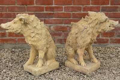 Lot 1364 - A pair of gate post finials in the form of boar