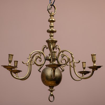 Lot 374 - An antique brass chandelier