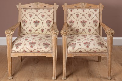 Lot 1179 - A pair of limed oak French Arts and Crafts open armchairs