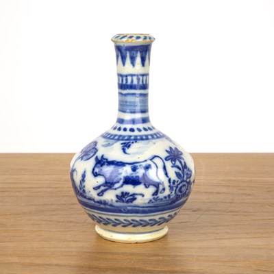 Lot 465 - Small blue glazed bottle vase Persian, circa...