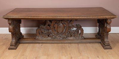 Lot 383 - An Italian Baroque style fruitwood refectory table