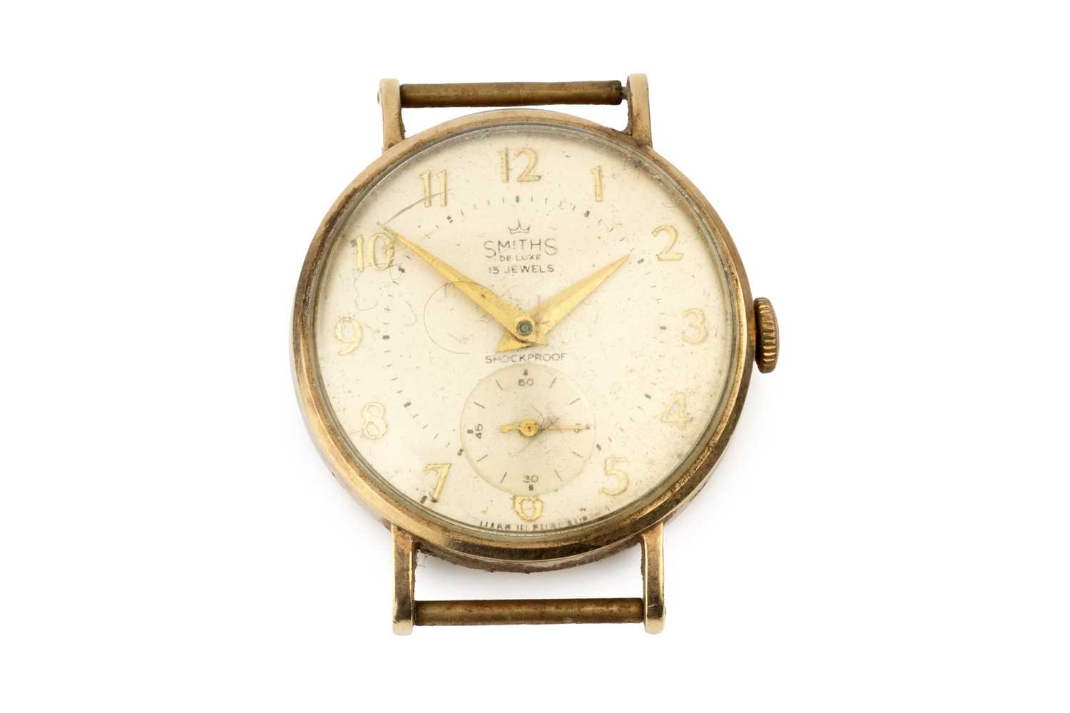 Lot A gentleman's 9ct gold wristwatch by Smiths,...