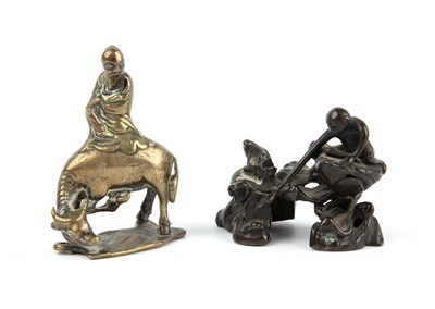 Lot 140 - Two 19th century eastern gilt metal figures...