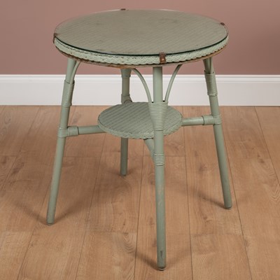 Lot 1212 - A pair of Lloyd Loom chairs and a matching circular table