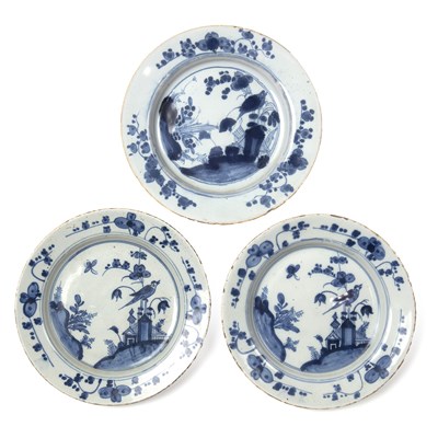 Lot 210 - Three 18th century English Delft desert plates,...