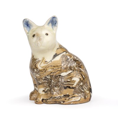 Lot 216 - A 19th century agate ware pottery cat, with...