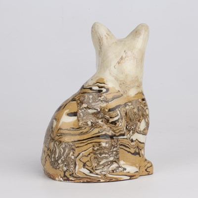 Lot 216 - A 19th century agate ware pottery cat, with...