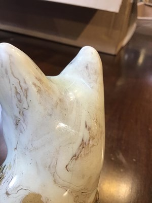 Lot 216 - A 19th century agate ware pottery cat, with...
