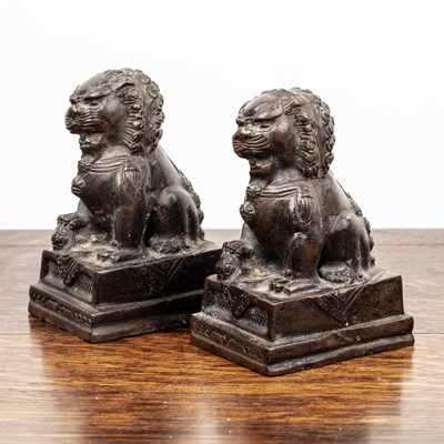 Lot 209 - Pair of small bronze models of temple dogs...