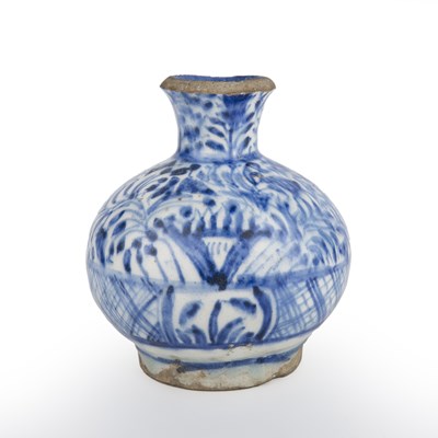 Lot 219 - An early 18th century Meshed Kirman pottery...