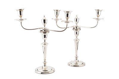 Lot 871 - A pair of George III silver candlesticks, with...