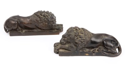 Lot 26 - A pair of 19th century of bronze recumbent...