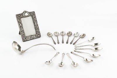 Lot 308 - A Dutch silver sauce ladle, with beaded...