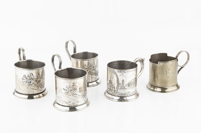 Lot 245 - Five Russian silver plated cup holders, one...