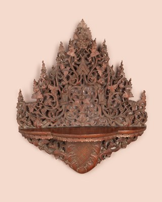 Lot 212 - A pierced carved Indian hardwood wall hanging brackets