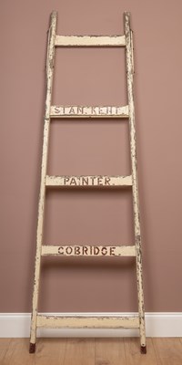 Lot 1319 - A white painted decorator's ladder