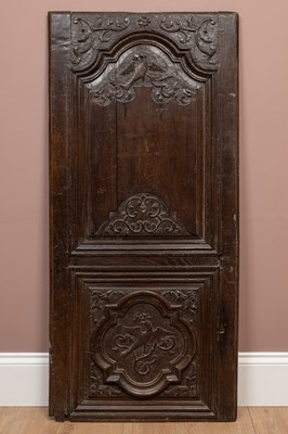 Lot 318 - An antique carved oak French cupboard door