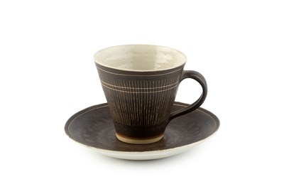 Lot 589 - Lucie Rie (1902-1995) Cup and saucer manganese...