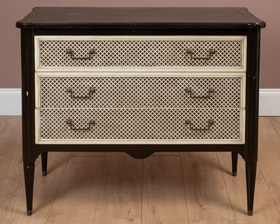 Lot 1103 - A black and white painted Italian style chest of three drawers