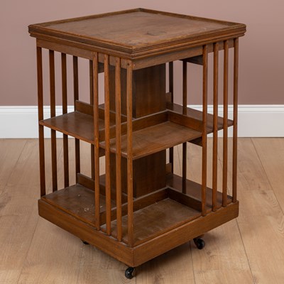 Lot 292 - An oak rotating bookcase